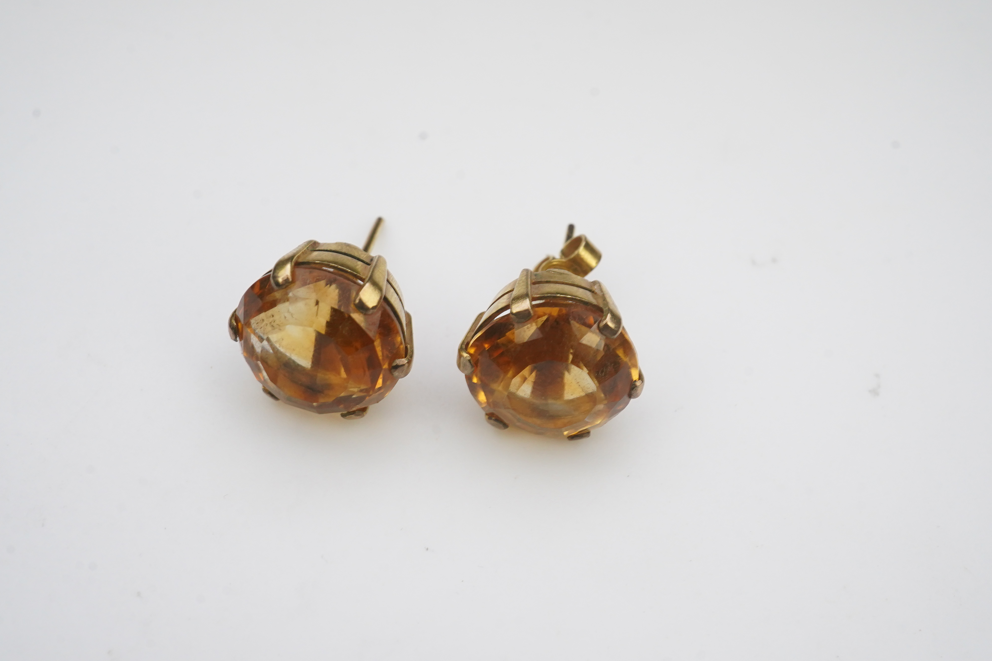 A pair of citrine ear studs